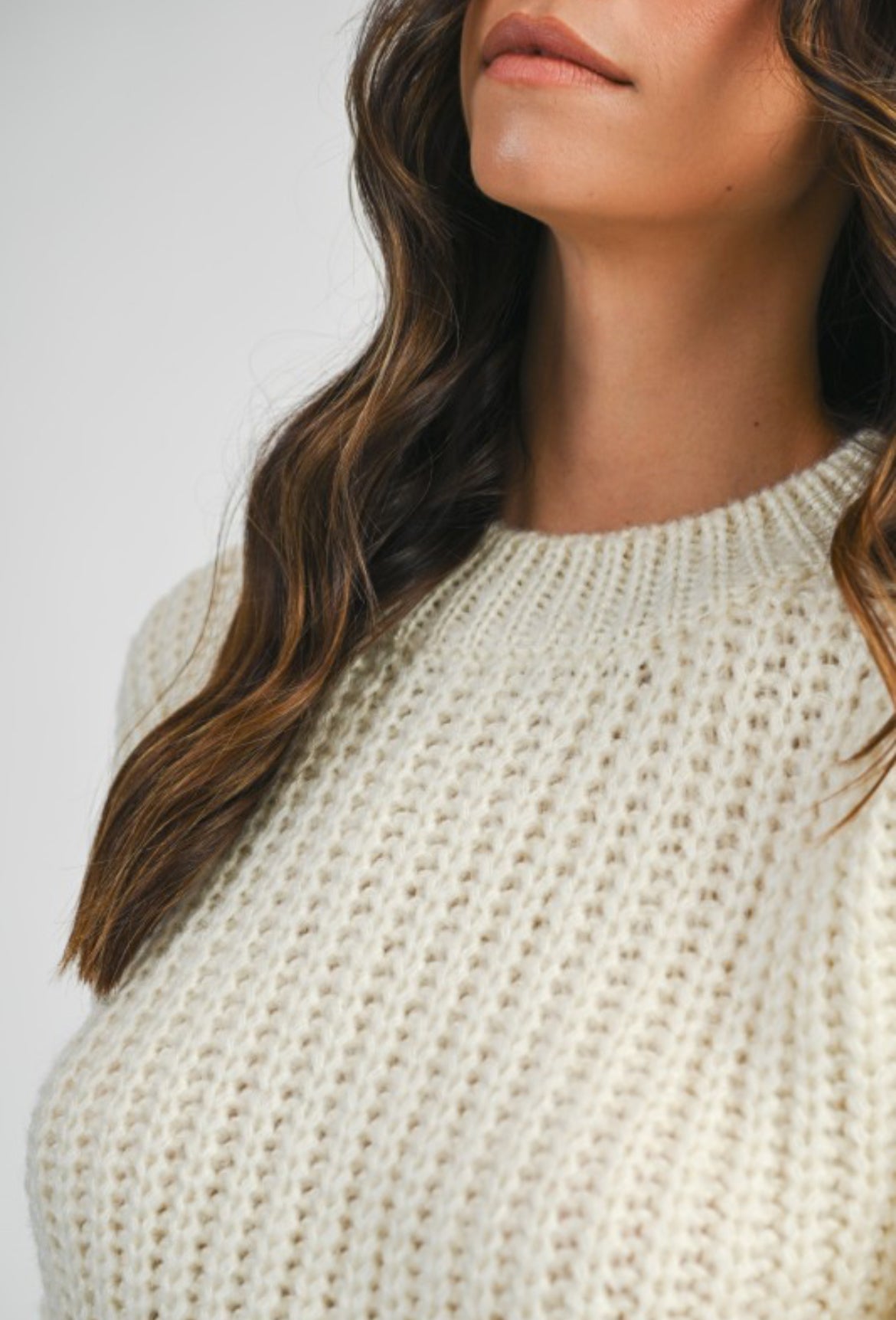 White knitted sweater